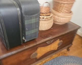 down the hall bedroom on the left. 1950's cedar chest, braided rug