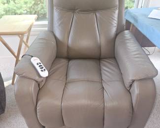 Electric lift chair in working condition located in sunroom.  bring help to load
