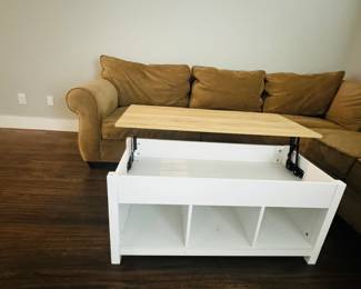 Raising coffee table