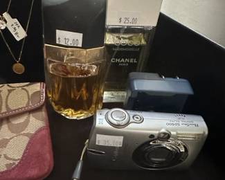 Coach Wallet, Coco Chanel Perfume, Canon Powershot Camera
