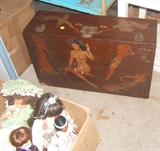 Somebody's old wooden case, decorated up with nudie cuties...
