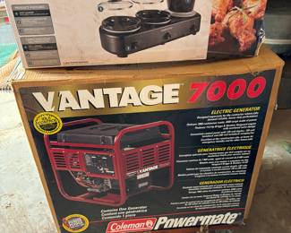 New in box generator and new in box triple slow cooker. 