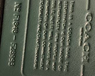 #11	Green Leather Coach - w/Leather Tag w/serial number inside	 $40.00 
