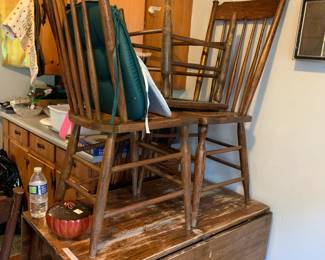 #105	drop side as is finish table with 4 chairs as is seat 22x42x39x29	 $75.00 
