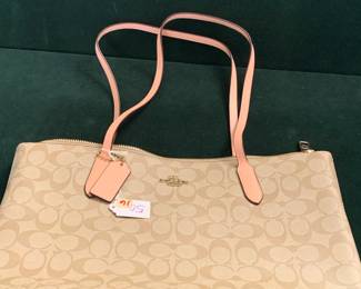 #16	Coach Tan Fabric Shoulder Bag (has serial number)	 $50.00 
