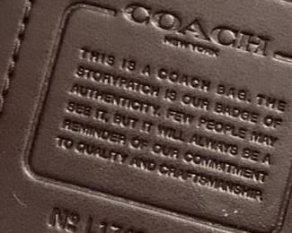 #12	Tan Fabric Coach Shoulder Bag/Clutch  w/serial number	 $40.00 
