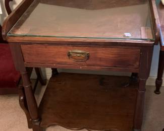 #66	Antique Wood Table w/high Back, 1 drawer shelf on Bottom & Protective Glass on Top - 24x19x30	 $50.00 
