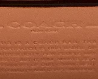 #16	Coach Tan Fabric Shoulder Bag (has serial number)	 $50.00 
