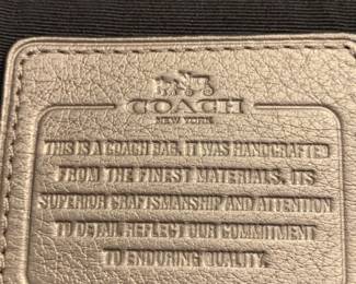 #14	Coach Silver Leather Shoulder Bag (no serial number inside)	 $60.00 

