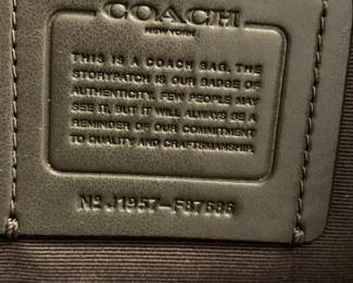 #15	Coach Silver leather Clutch (has serial number inside)	 $40.00 
