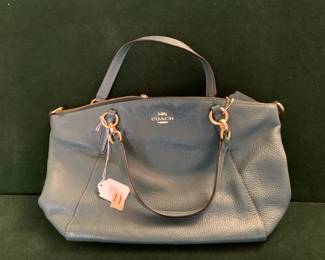 #11	Green Leather Coach - w/Leather Tag w/serial number inside	 $40.00 
