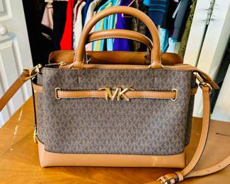 Lady's Coach and Michael Kors handbags...