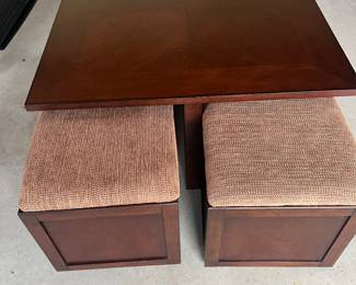 Oversized coffee table with 4 ottomans that also double as storage. Perfect for game nights! 