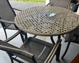 Wrought iron patio table with 4 chairs 
