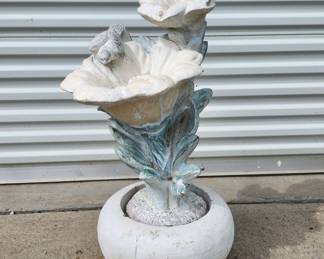 Garden fountain flowers and birds