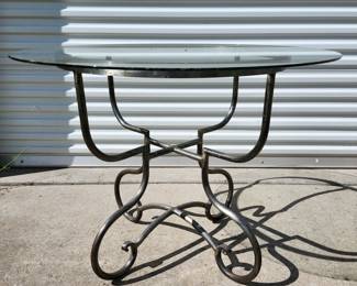 Iron base glasstop table
