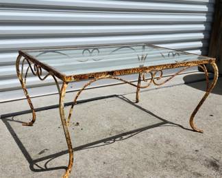 Glass top metal coffee table