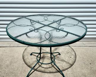 Metal table with glass top