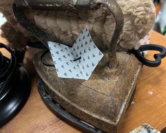 Antique sad iron with trivet
