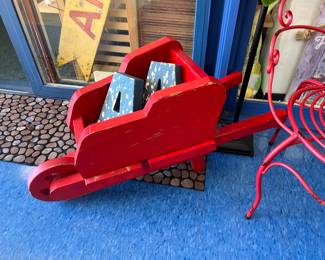 wooden wheelbarrow planter