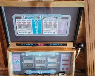 Universal slot machine with manual