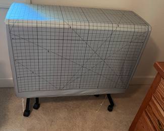 AmeriCraft folding table with ironing pad