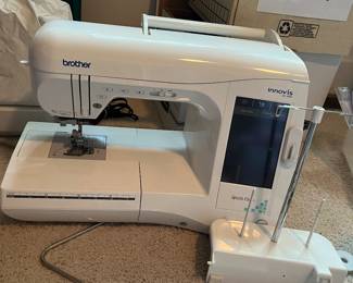 Brother Innovis 1000 sewing machine with attachments