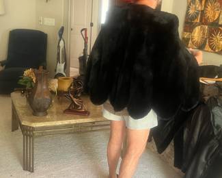 Back of cape complete with shoes and hat