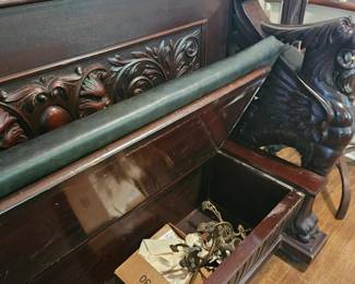 Brass hooks attach to mirror