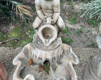 Concrete Boy pouring water Fountain