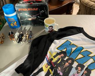 Lunch box has been removed from sale. Kiss tee from 1985 Little Rock concert. Original Star Wars action figures, some hard to find.