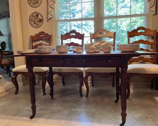 Sofa table with drop leaf on both ends from Regency era Great Britain circa 1810.