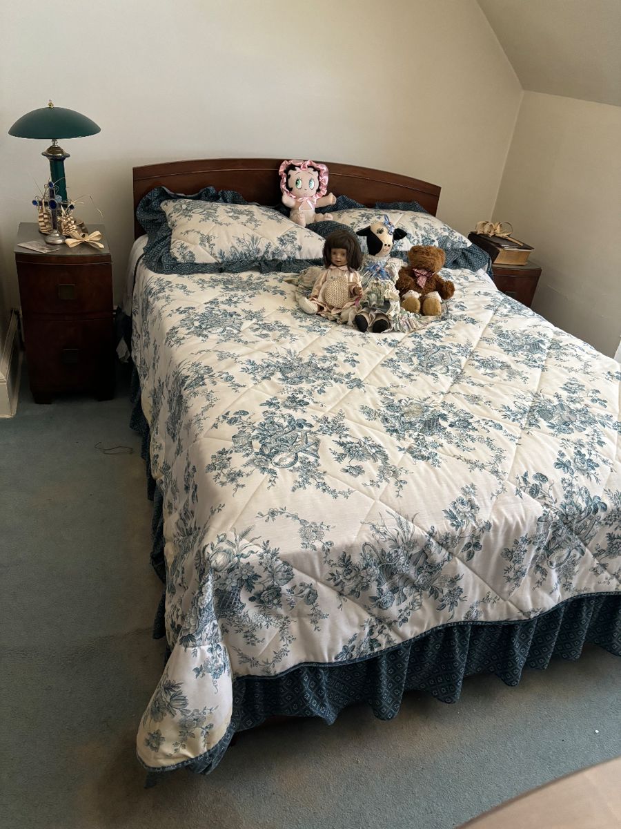 Five piece mahogany bedroom set includes headboard, footboard, two night stands, dresser with six drawers and armoir