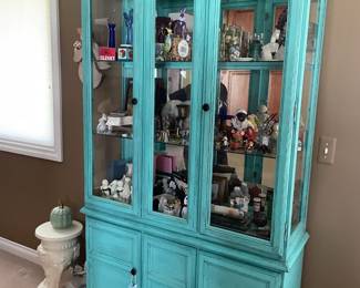 . . . antiqued cabinet