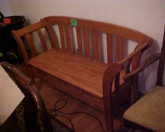 Very nice wooden bench with under the seat storage.
