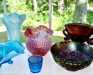 Blue opalescent, cranberry opalescent, amethyst fish handled vase, amethyst carnival glass bowl