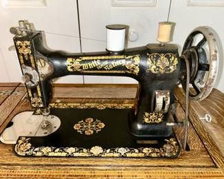 Antique White treadle sewing machine in excellent condition