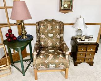 green painted side table (SOLD), wooden side table w/ drawers, Animal print upholstered chair, brass lamp, Waterford crystal table lamp