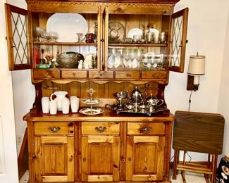 Wooden hutch, Fenton Milk glass hobnail pitcher and glass set, stainless steel coffee server set, large silver plate tray, large iron stone oval platter, wine stems, etc., set of 4 wooden TV trays on stand