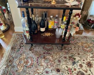 Beautiful inlaid table that can be used as a bar.