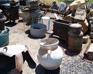 Milk Cans, old stoves and yard art items