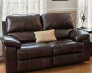 Electric recliner leather-like loveseat. Minimal clearance needed from wall.