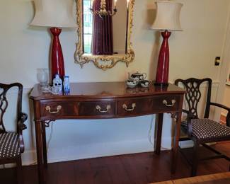 Mahogany Server by Councill Craftsman, pair of Sang-de-bouf bottle lamps, Chippendale gilt mirror.