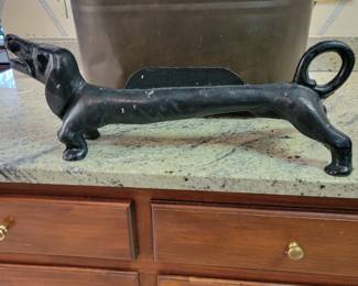 Dachshund boot scraper and a copper
hot water boiler.
