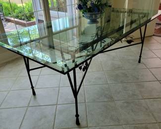 Wrought Iron Table with beveled plate glass top. 42"× 78" × 30".  In the style of Diego Giacometti.  Bench Made.