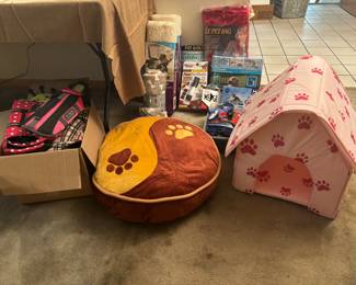 Dog care and accessories. Lots of dog clothes