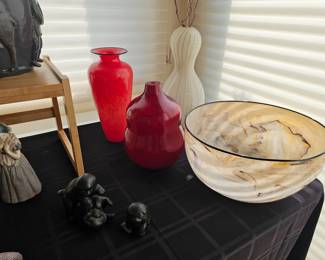 82. Robert kuo glass vessel among other pieces of glass
83. Lisa Aronzon hand blown glass
84. Three bronze puppies. Japanese. Signed: Chiko, Taisho Period. C. 1915.