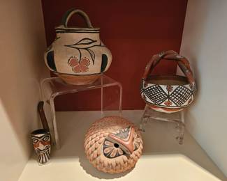 12. Isleta Pueblo Indians Smoking Pipe. In the family since 1939.
13. Santo Domingo Polychrome bowl. Gourd or melon shape Berries cluster of 4 on branch w/leaves. C. 1930 15. Two Piece Pottery Fluffy Owl Figurine. Laura Gachupin. Jemez Pueblo. 3.5" high x 4-1/8" diameter. Face is removable.
16. Isleta Pueblo polychrome basket bowl with twisted double handle. C. 1920.