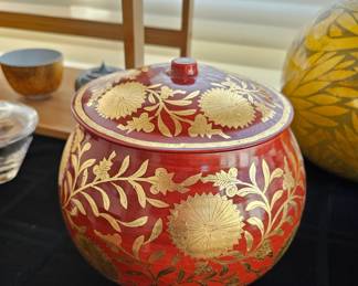 38. Kato Hajime 1900 - 1968
Round waterjar chrysanthemum pattern porcelain with matte red glaze
8 1/4 x 8 1/2