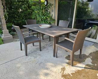 46. Dedon patio set table 4 chairs